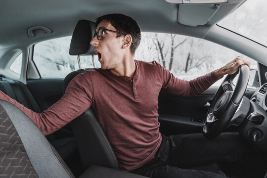 Male driver was backing up and hit another car in the parking lot. The concept of negative emotions and insurance in case of damage to the vehicle