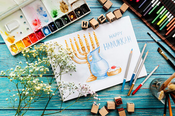 Top view of a watercolor art Happy Hanukkah