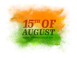 15Th Of August Happy Independence Day Text With Ashoka Wheel On Saffron And Green Powder Splash Background.
