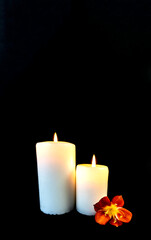 Candle on a black background, postcard, Flat Lai on death and funeral