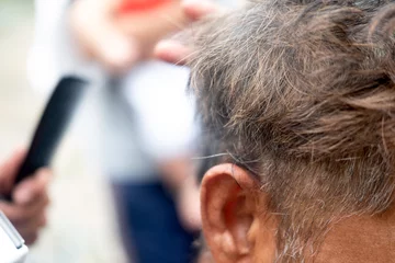 Fotobehang Kapsalon Hairdresser making stylish haircut for old men home, during quarantine  © Dontree