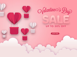 Valentine's Day Sale Poster Design With 50% Discount Offer, Paper Cut Hot Air Balloons And Clouds On Pastel Pink Background.