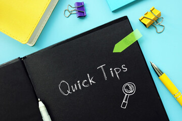 Business concept about Quick Tips k with inscription on the piece of paper.