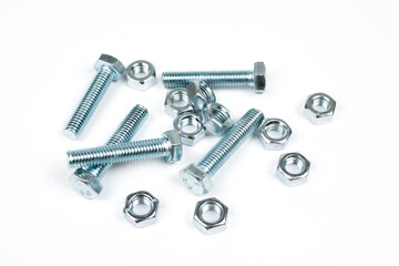 metal nuts and bolts on a white background