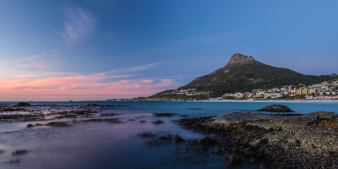 Naklejka na ściany i meble Camps Bay Cape Town in the evening.