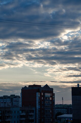Fototapeta na wymiar Silhouettes of buildings against the sky
