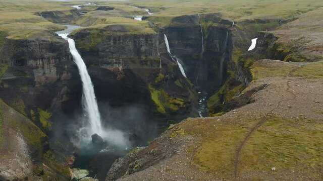 Haifoss waterfall in Iceland, Aerial view. Natural wonder Landmannalaugar canyon.