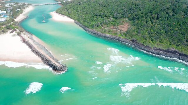 Burleigh Heads National Park aerial image with Tallebudgera creek and sand pumping/dredging boat