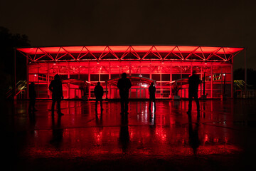 Evolution London lit up red