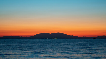 Naklejka na ściany i meble Sunset on the Aegean sea in Greece