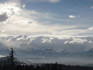The view from Rzepiska to the clouds over Tatra Mountains.