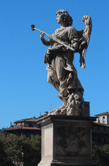 Obraz premium Angel with sponge at at Castel Sant'Angelo,(Ponte Sant'Angelo)It sculptures by Antonio Giorgetti.One of the series of Angels with the Instruments of the Passion on the Ponte Sant'Angelo, Rome,Italy.