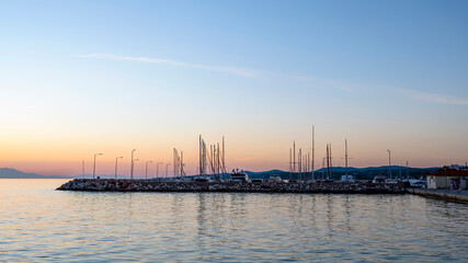 Sea port at sunset in Greece