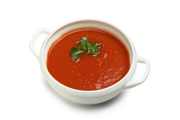 Bowl of tomato soup isolated on white background