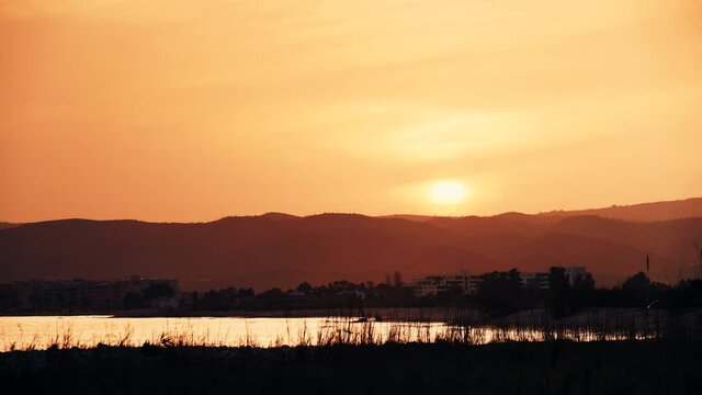 Red sunset over sea coastal landscape. Capi Corb, Mediterranean coast of Spain.
