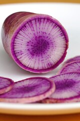 Slices of purple and white Blue Meat radish