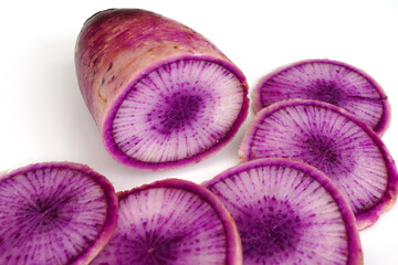 Slices of purple and white Blue Meat radish