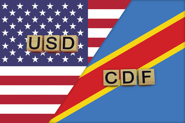 USA and Democratic Republic of the Congo currencies codes on national flags background