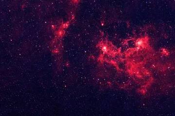 Foto op Canvas A bright, red galaxy. Elements of this image were furnished by NASA. © Artsiom P
