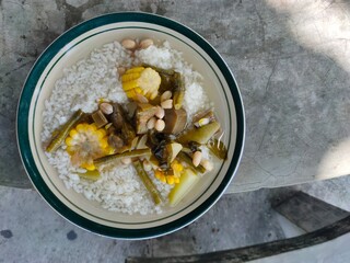 Tamarind vegetable rice on a plate