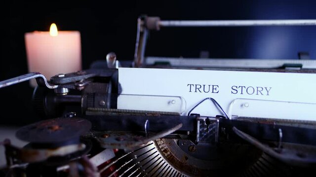 old typewriter on table, words true story are printed on paper in large size, retro style, concept of writer, journalist, private detective, selective focus