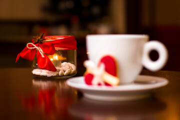 Valentine's Day with tea and sweet cake heart and lantern