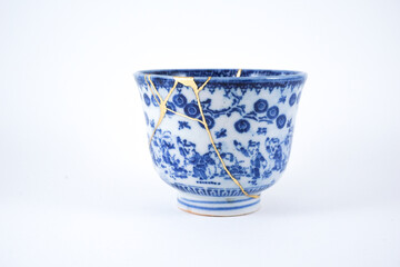 White and blue decorated Japanese tea cup