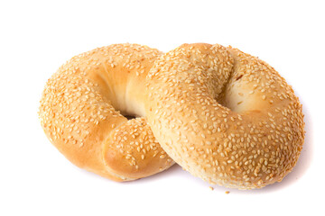 two sesame bagels isolated on white