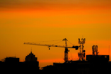 Background image of construction site during sunset