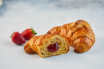Strawberry croissant in cut close up