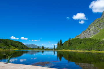 Fototapeta na wymiar lake and mountains (Wiegensee, Vorarlberg, Austria)