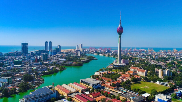 Fototapeta View of the Colombo city skyline with modern architecture buildings including the lotus towers.