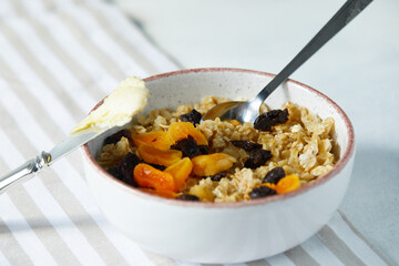Porridge with dried fruit close up