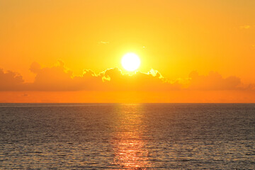 Scenic sunset sky at sea
