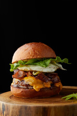 Juicy fresh burger on the wooden board