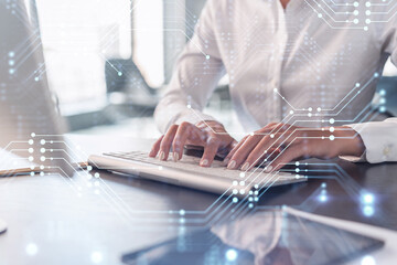 Woman typing the keyboard to create innovative software to change the world and provide a completely new service. Close up shot. Hologram tech graphs. Concept of Dev team. Formal wear.