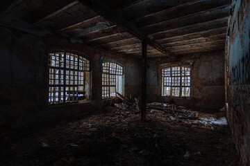 Fototapeta na wymiar Inside old Orlovka Asylum for the insane in Voronezh Region. Dark creepy abandoned mental hospital
