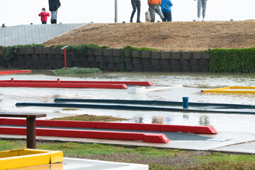 putt putt course or mini golf course flooded with rain water concept Winter weather and climate
