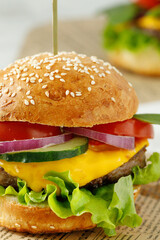 Yummy bright burger close-up
