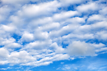 Background and texture of clouds on a blue sky. Freshness and naturalness of nature.