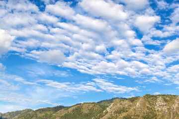 Background and texture of clouds on a blue sky. Freshness and naturalness of nature.