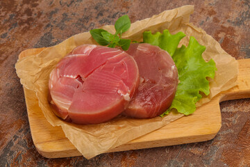 Raw tuna round steak for grill