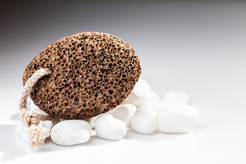Pumice stone for home spa over white background