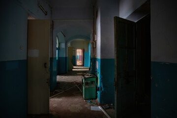 Dark dirty corridor of old abandoned building