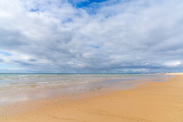 Fototapeta na wymiar beautiful wide empty golden sand beach