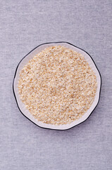 Dry oat flakes