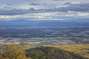 Fototapeta premium Picturesque French landscape - aerial view from the Haut-Koenigsbourg Castle. Valley, small towns and mountains in the background in the Bas-Rhin departement of Alsace, France.