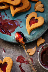 Czech traditional christmas sweets Linzer cookies with homemade red currant jam