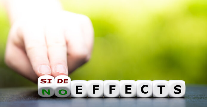 Hand turns dice and changes the expression "no effects" to "side effects".