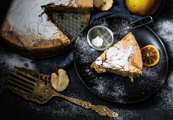 Tasty apple pie with powdered sugar